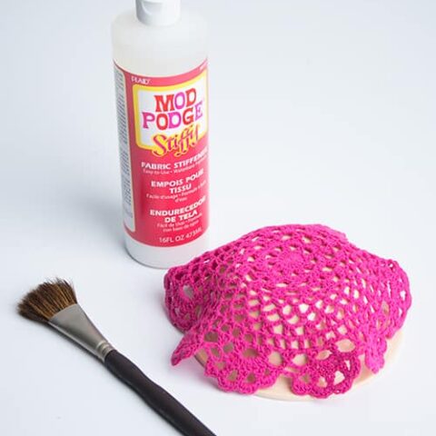 Use Mod Podge Stiffy to create unique doily covers for dessert plates - perfect in place of glass cloches! These are so pretty and easy to make.