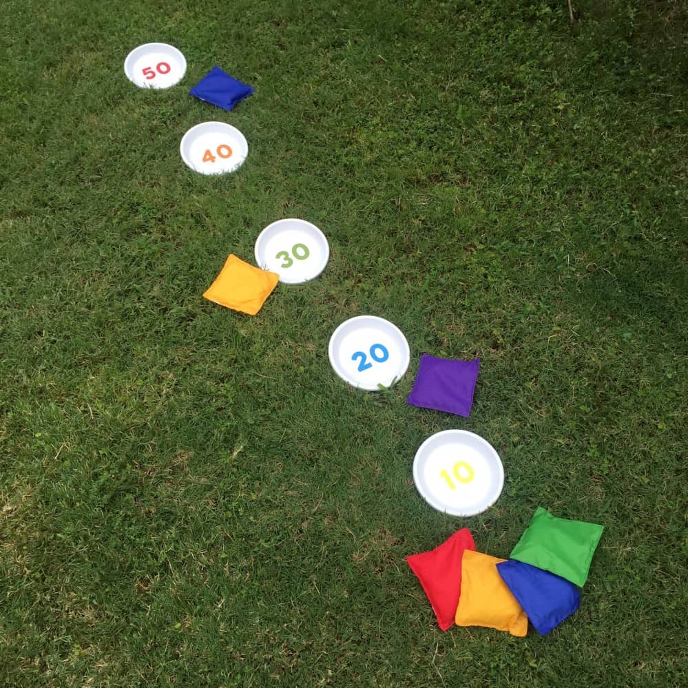 DIY bean bag toss game using clay pot saucers