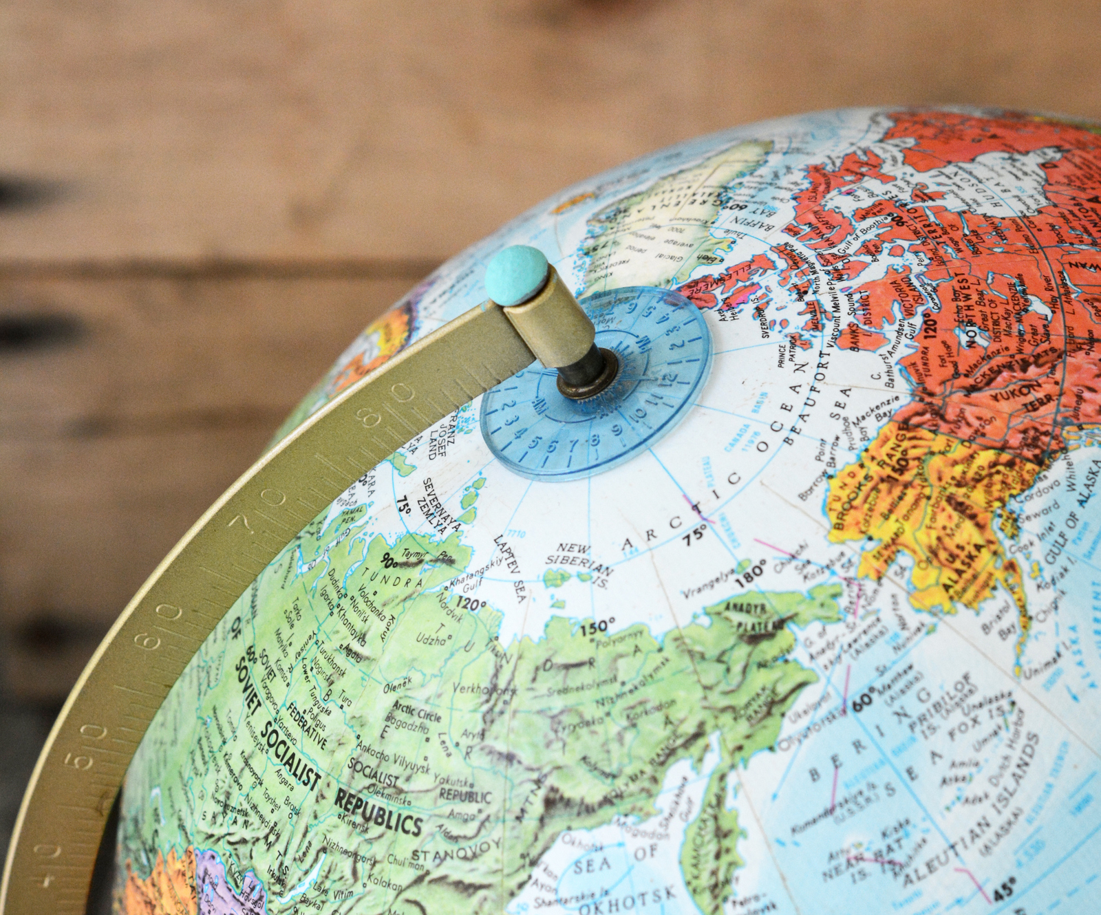 Learn how to customize a vintage globe with your favorite images from children's books - this is such a unique home decor project!