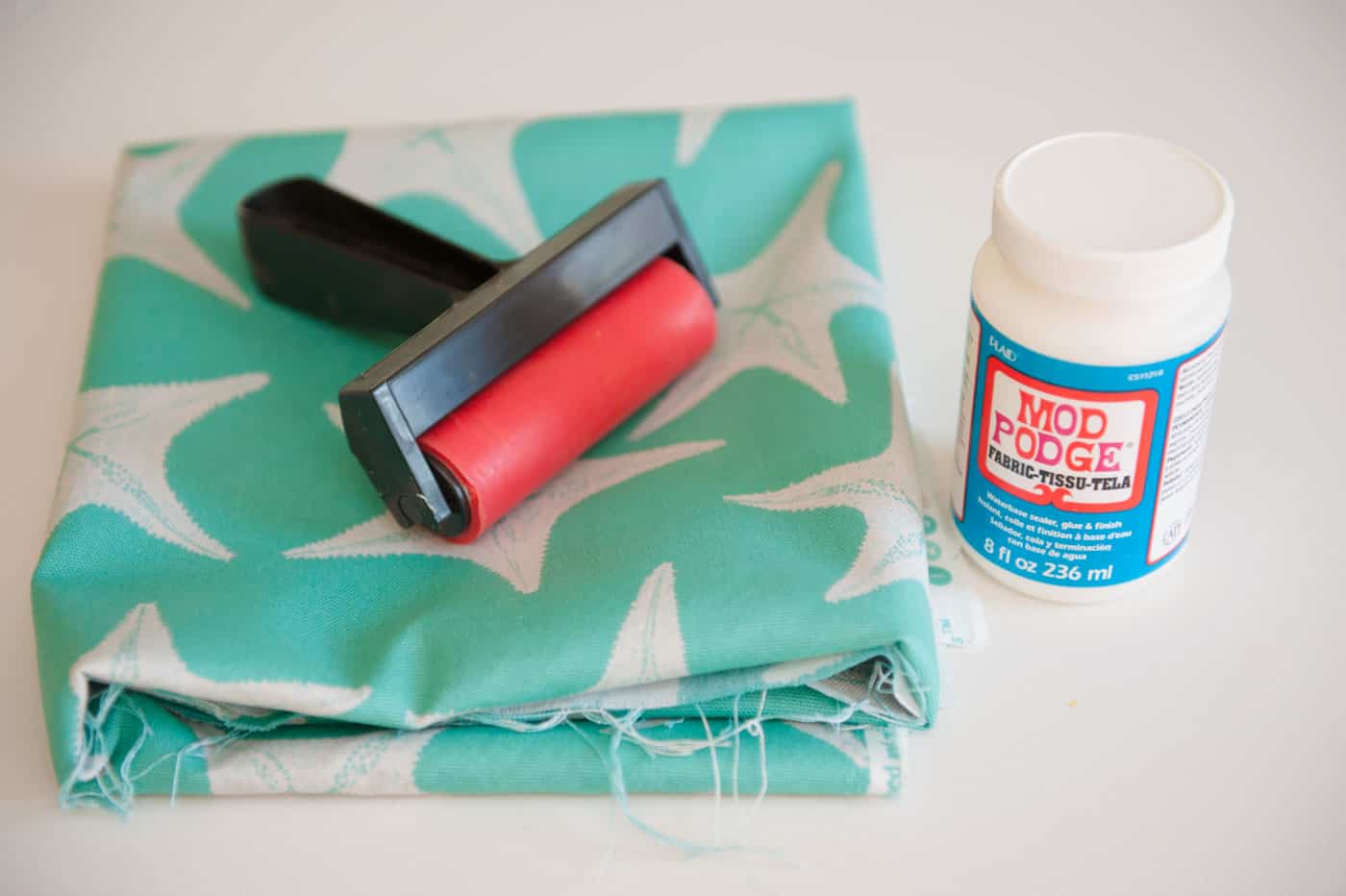 Starfish fabric, a Mod Podge brayer, and Mod Podge Fabric