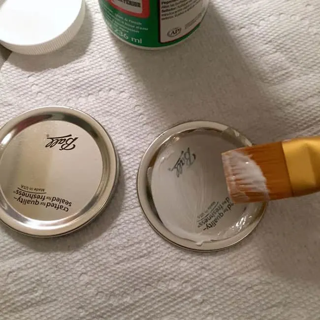 Painting Mod Podge Outdoor on top of a mason jar lid