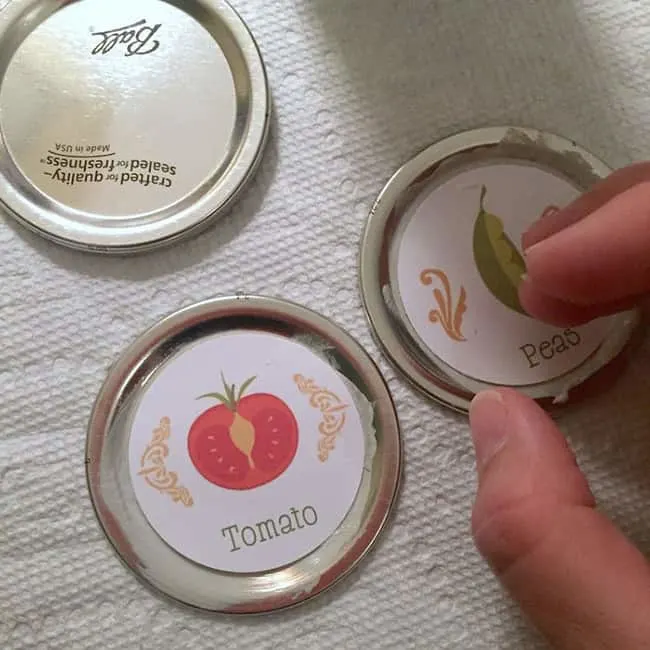 Apply labels to the tops of the lids and smooth