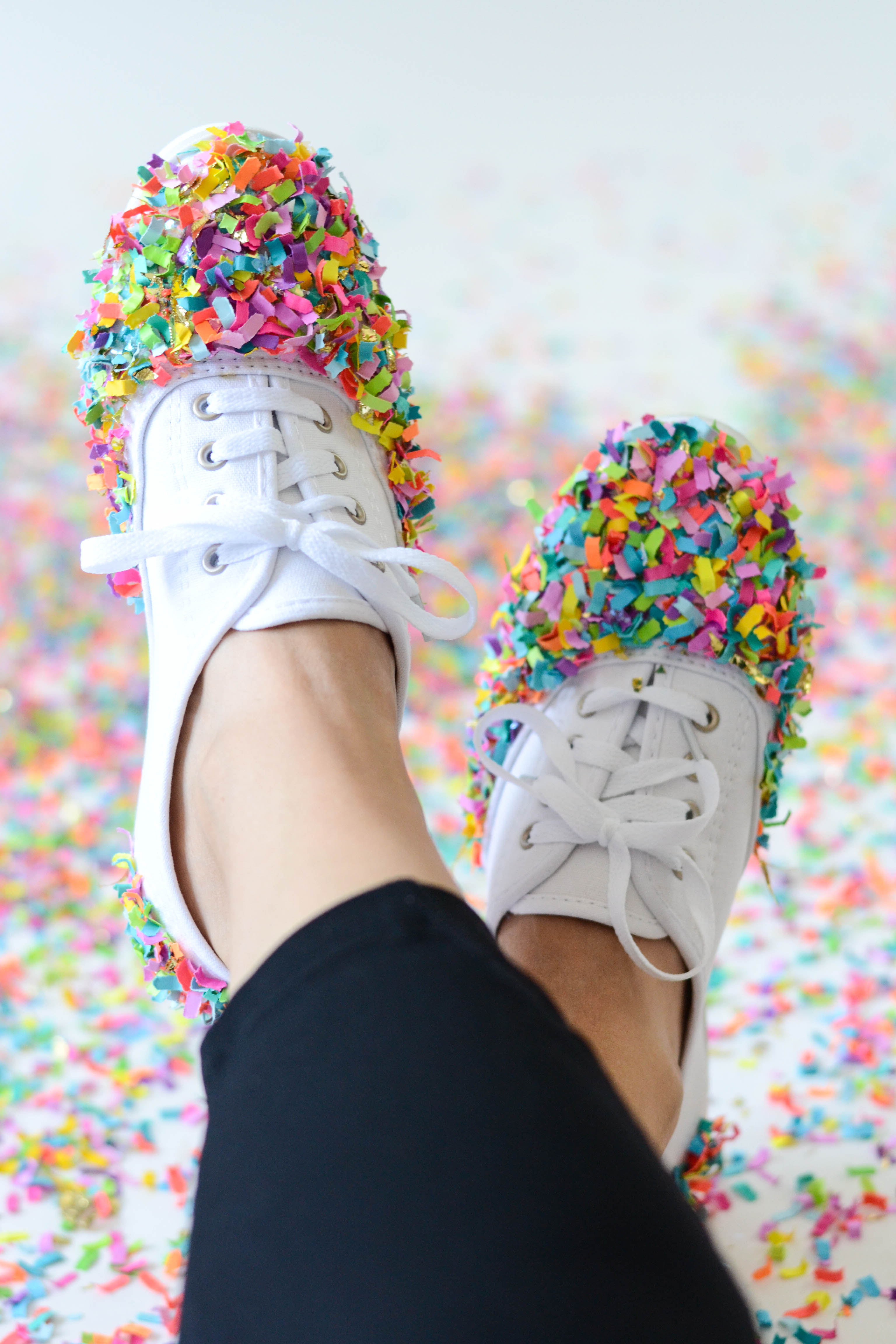 These DIY confetti dipped shoes are so fun! They are perfect for back to school, game days, or any other time you are feeling saucy or want to celebrate!