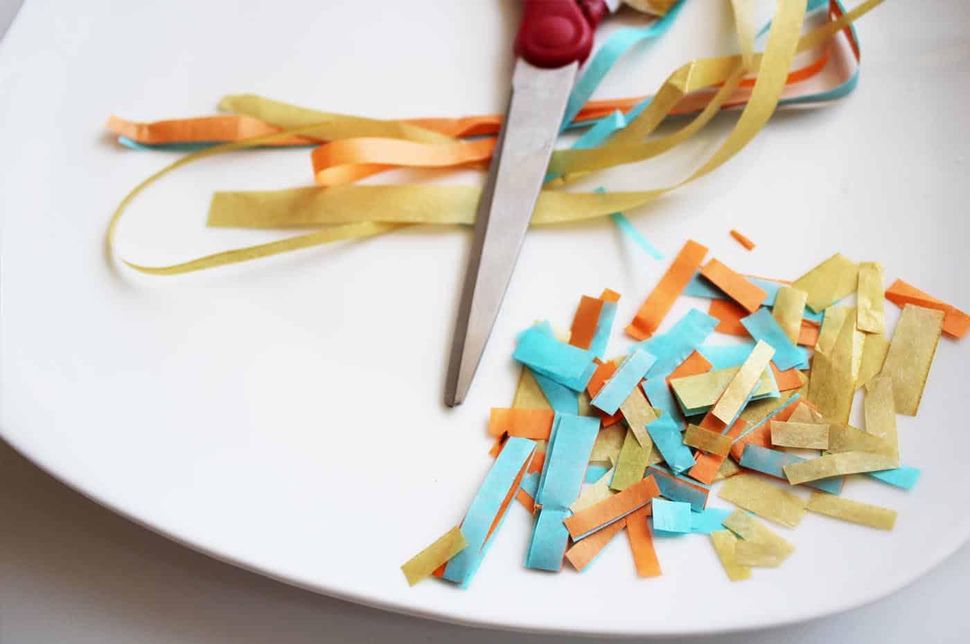 Tissue paper cut into thin strips with scissors