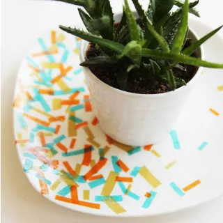 Use various colors of tissue paper and Dishwasher Safe Mod Podge to decorate a plate in this unique dollar store craft. Perfect for parties!