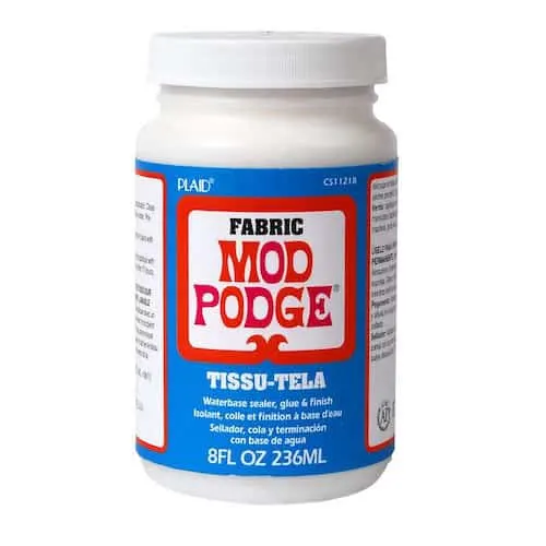 Learn all about the Fabric Mod Podge formula! Find out what it is, how to use it, and see some unique projects you can make.