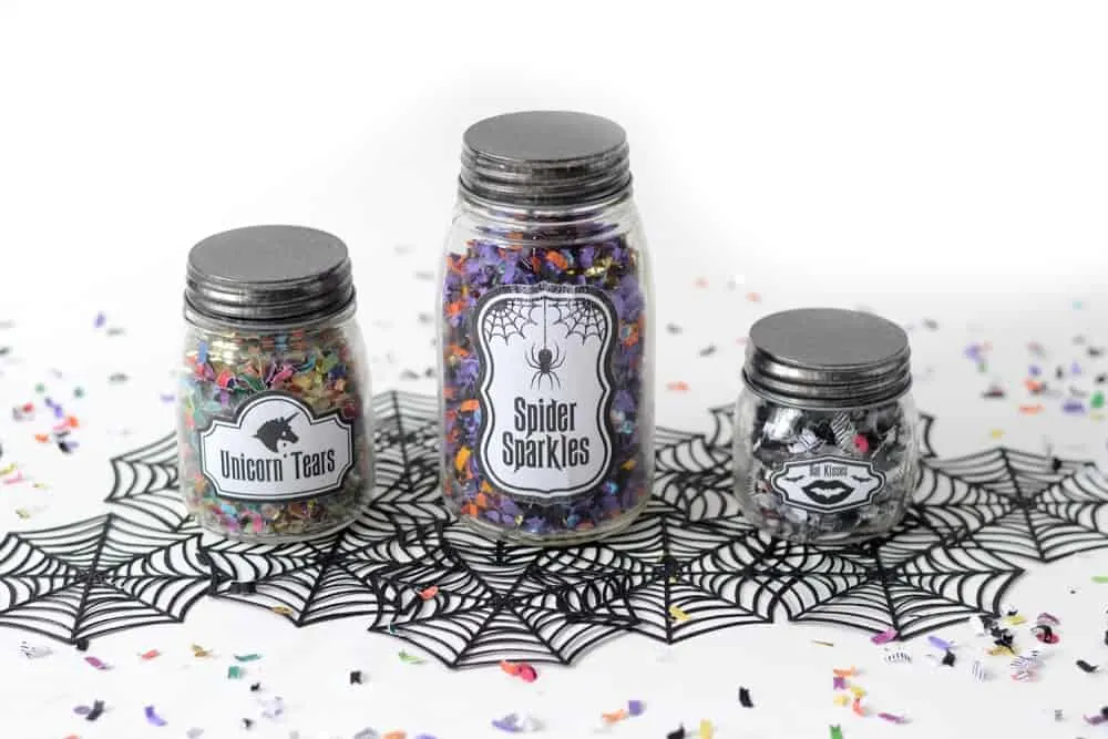 Unicorn tears spider sparkles and bat kisses confetti jars filled with Halloween confetti