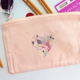 Decorate a bag with your favorite scrapbook paper AND make it washable using this image transfer technique! It's easy with Mod Podge Photo Transfer Medium.