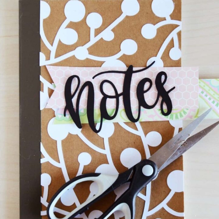You're going to love this DIY notebook idea, which uses Mod Podge and an overlay to make it pretty. Keep all of your notes and plans inside. So cute!