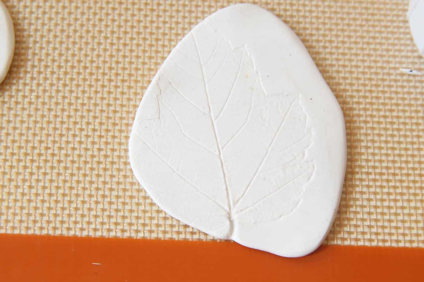 Clay piece with a leaf design