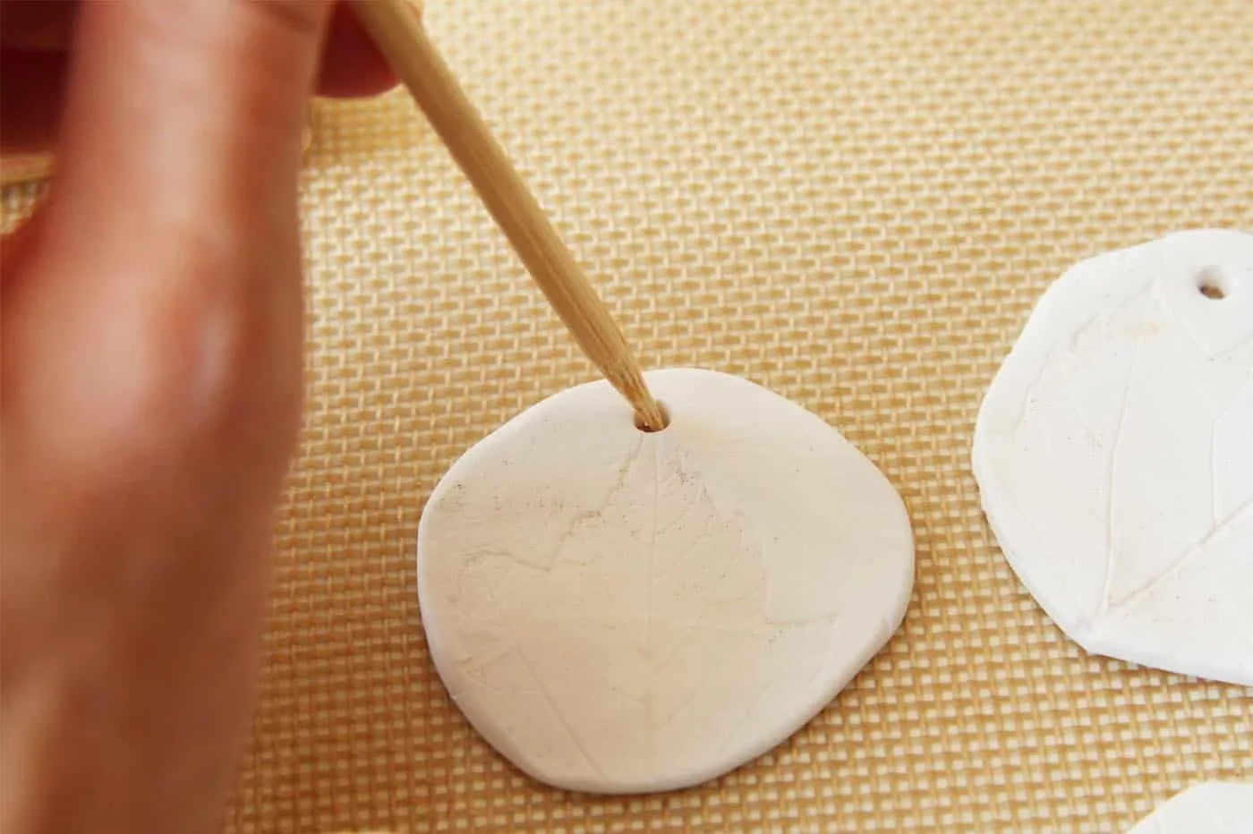 Poke a hole in the top of your clay gift tag
