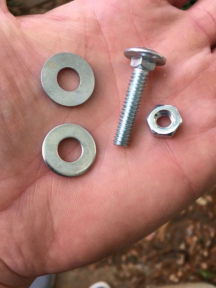 ¼” bolt (1” length), two washers, and a nut