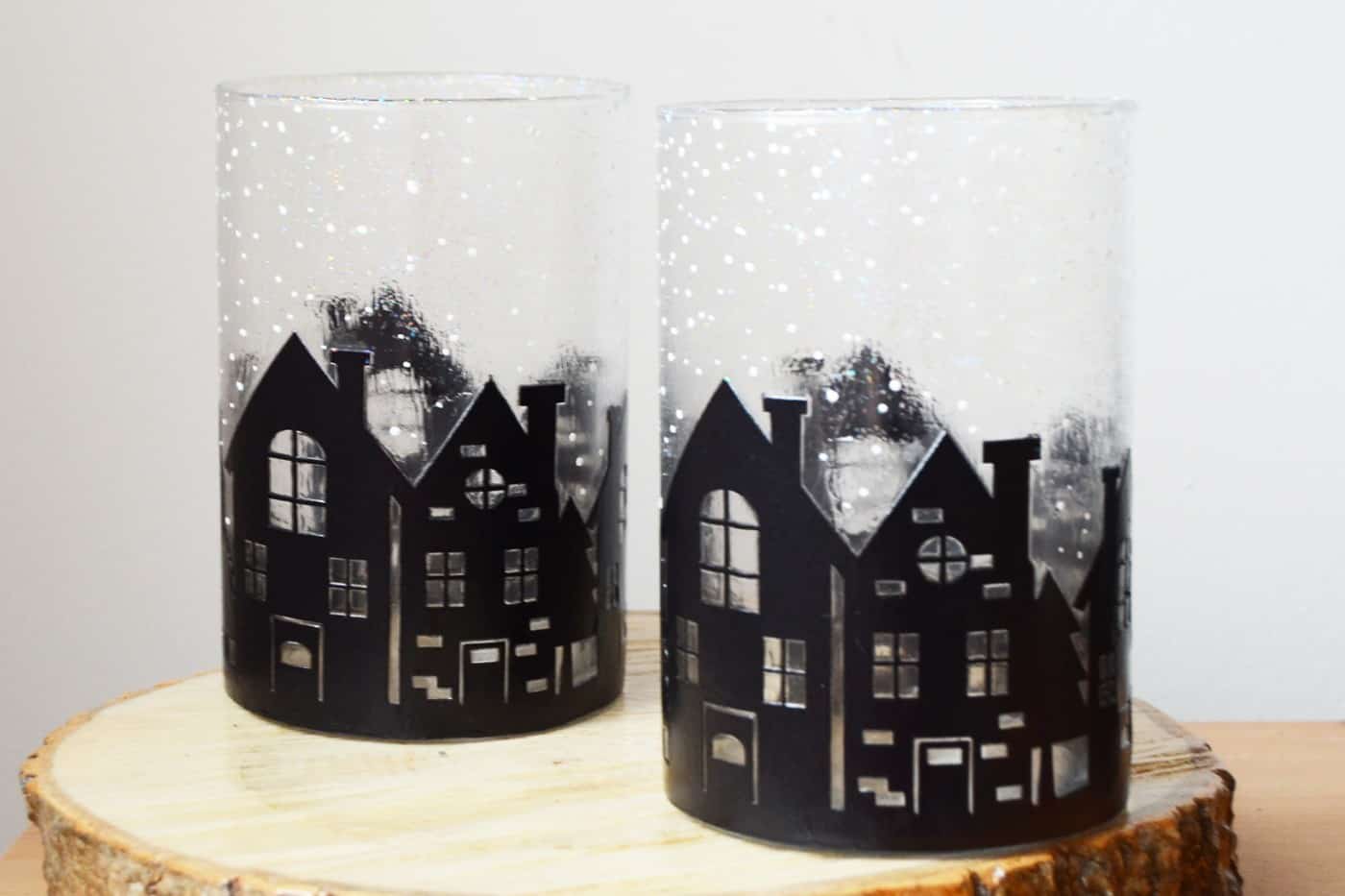 Unique winter vases decorated with village silhouettes and snow