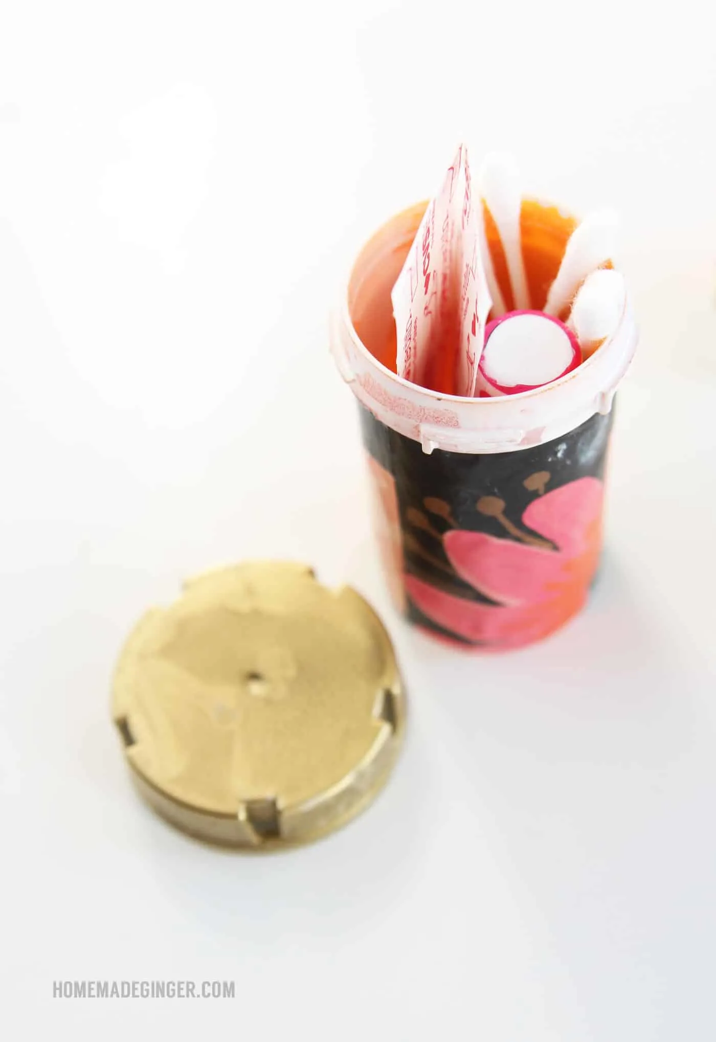 If you have a giant purse, I have a solution to losing things in the black hole - recycle pill containers into organizers! These are so easy to make.