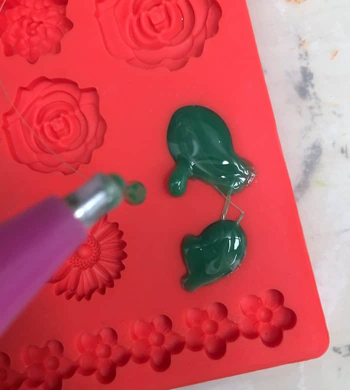 green Mod Melt stick in a Mod Mold