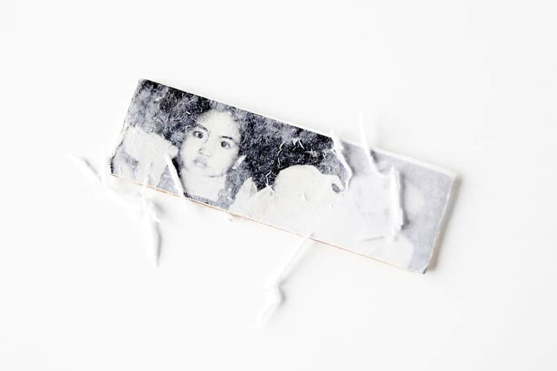 Rubbing paper off of a photo transfer keychain