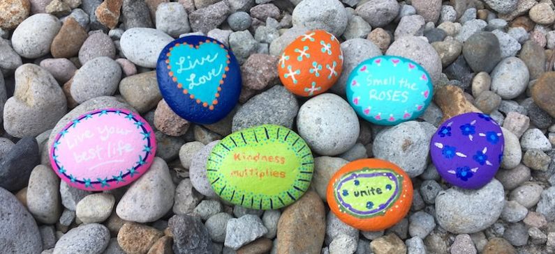 Kindness Rocks on a bed of rocks