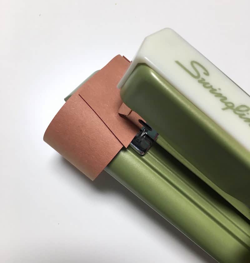 Stapling a paper ring using a green stapler