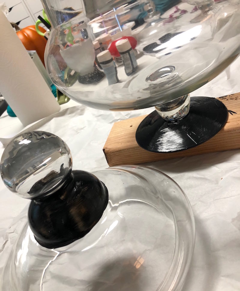 Glass painted with black multisurface paint