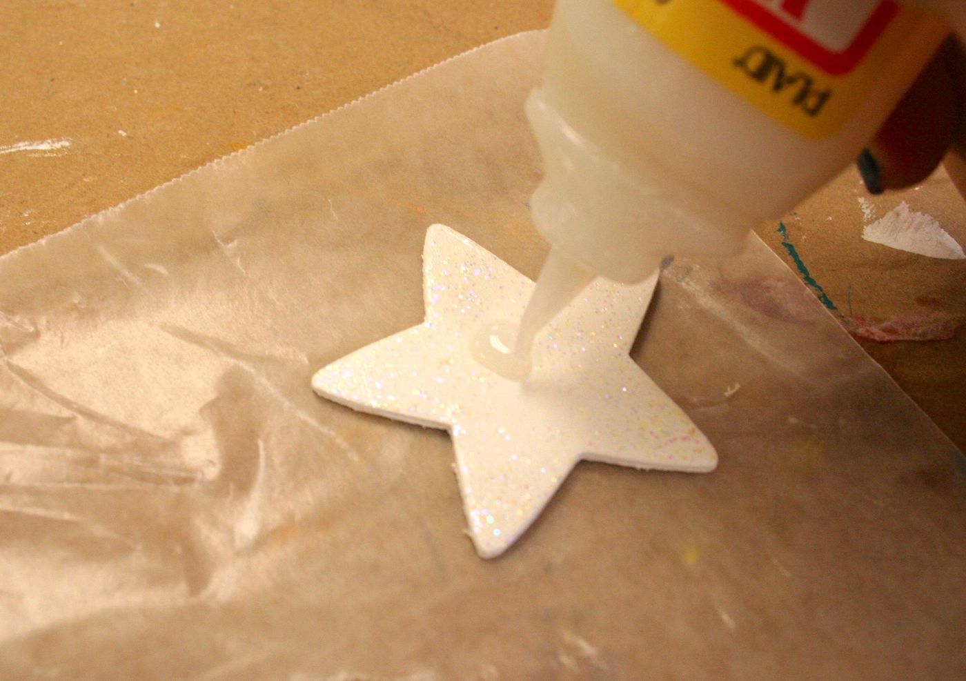 Adding Dimensional magic to the top of a painted wood star