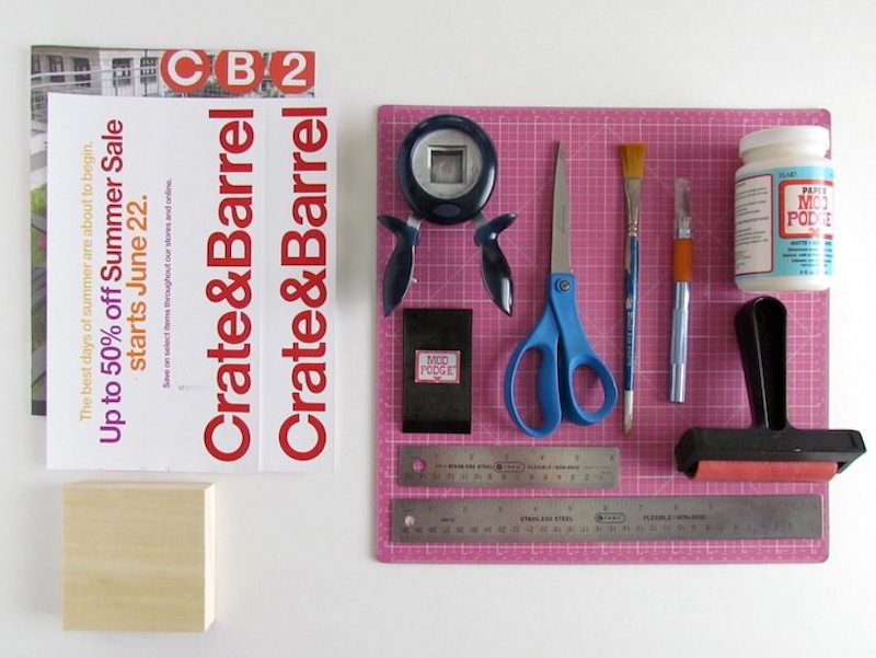 Junk mail, punch, scissors, paintbrush, craft knife, Mod Podge, ruler, and brayer