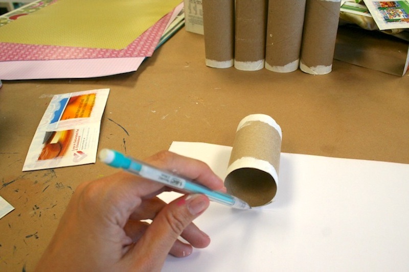 Tracing toilet paper rolls on paper