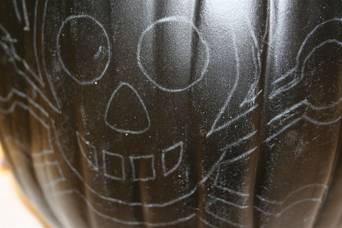 Skull pattern traced onto the front of the pumpkin