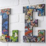 Wood letters covered with comic books