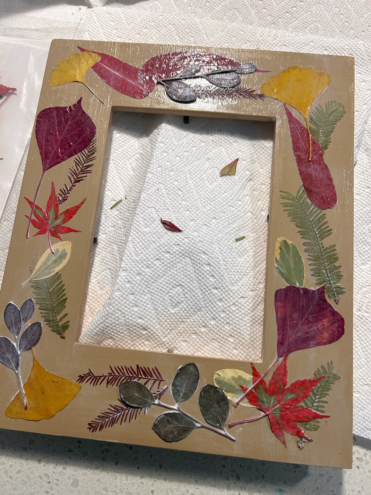 sealing the frame with mod podge