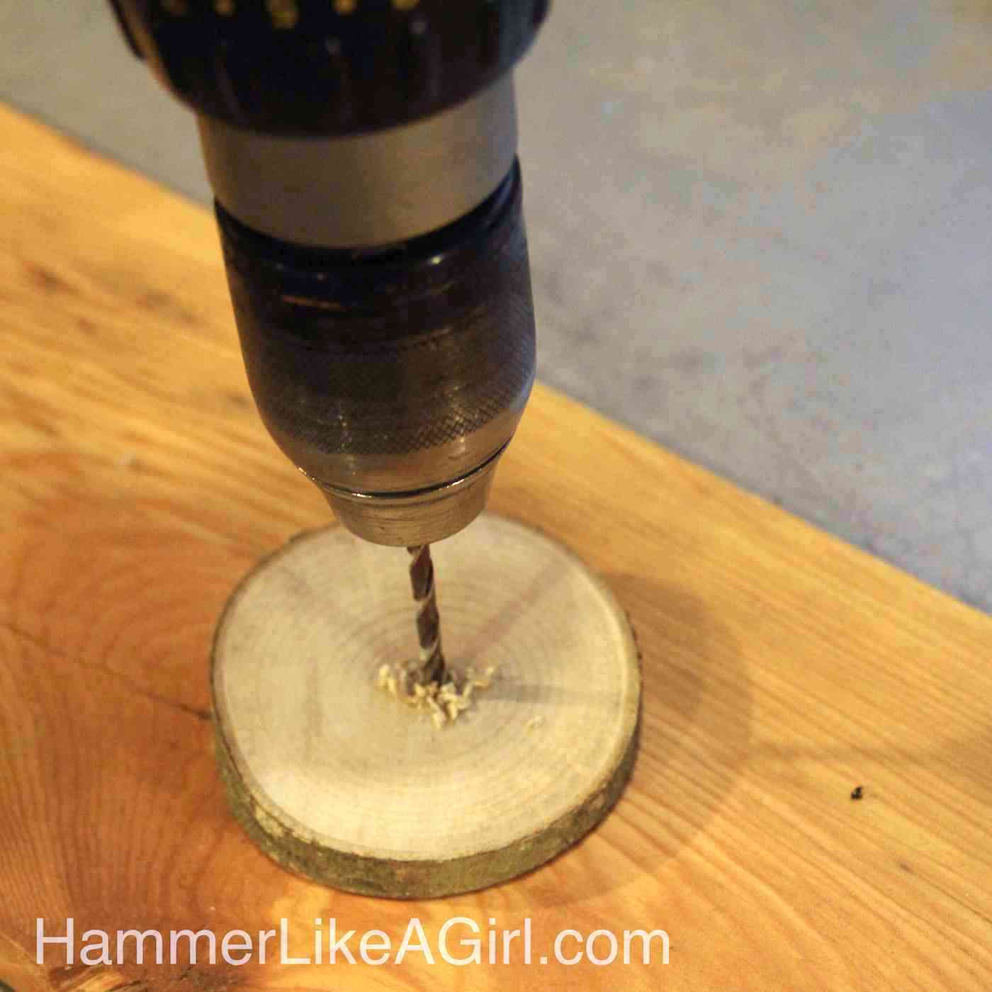 Drilling holes into the center of wood coasters