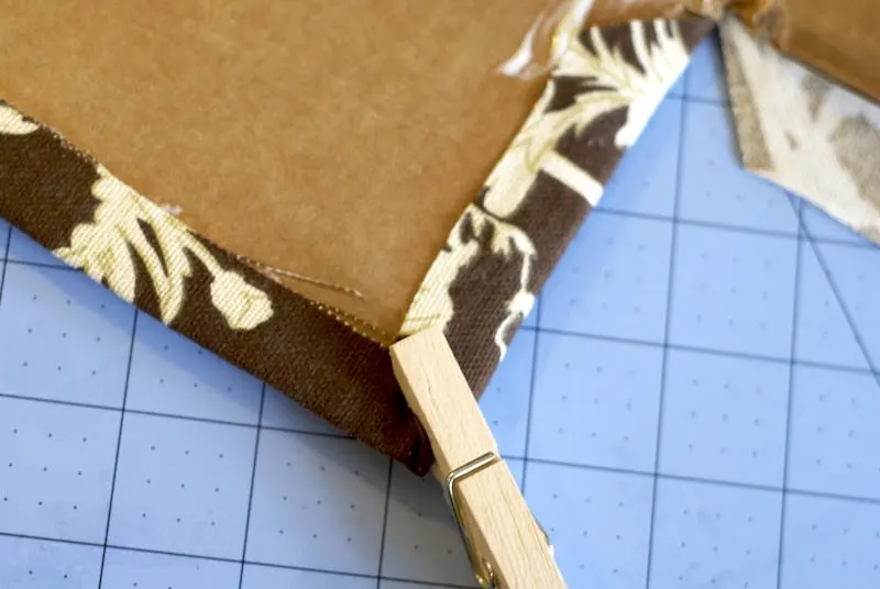 Clothespin holding the fabric in the corners
