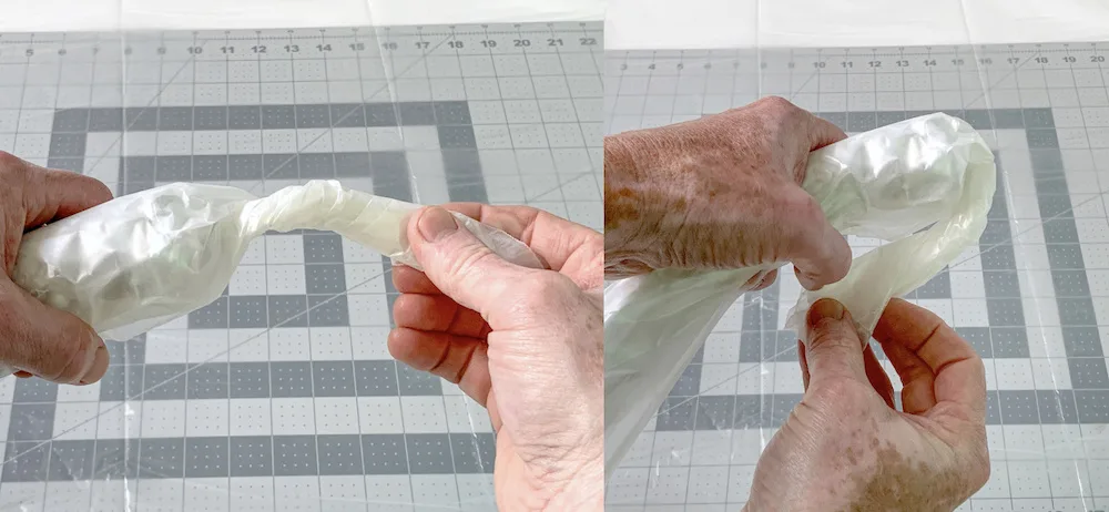 Twisting the ends of the wax paper and aluminum foil roll