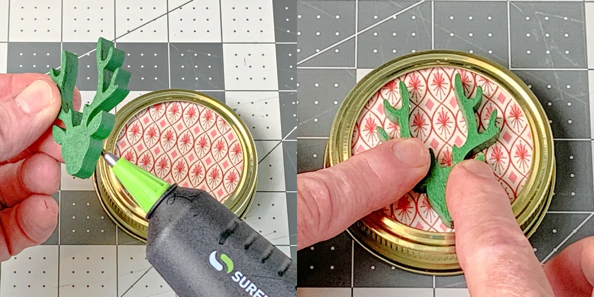 Gluing the deer to the center of the mason jar lid