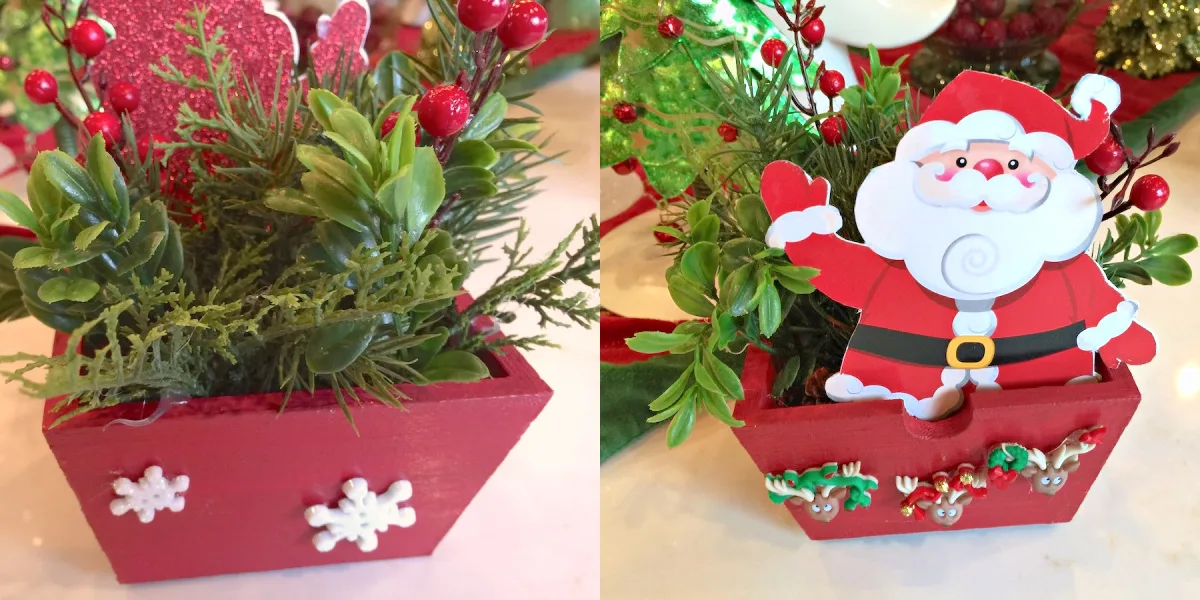 Greenery and Santa added to the red wood basket
