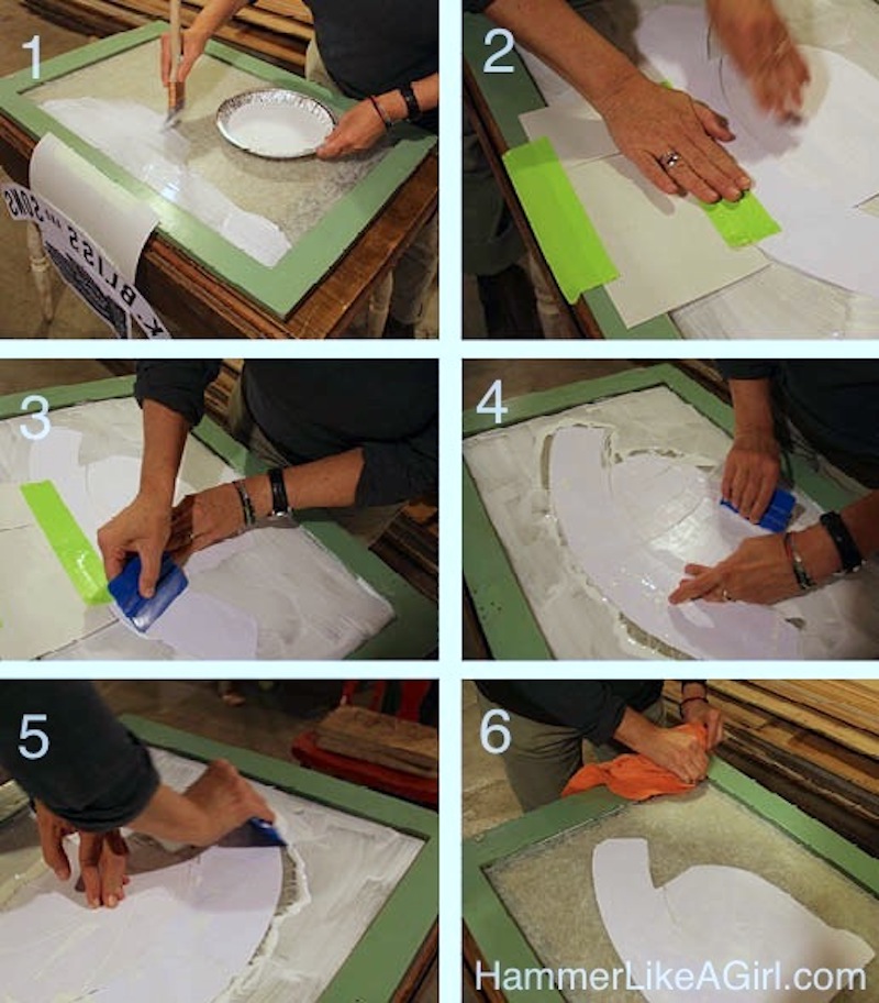 Applying the images to glass and using a squeegee to smooth down