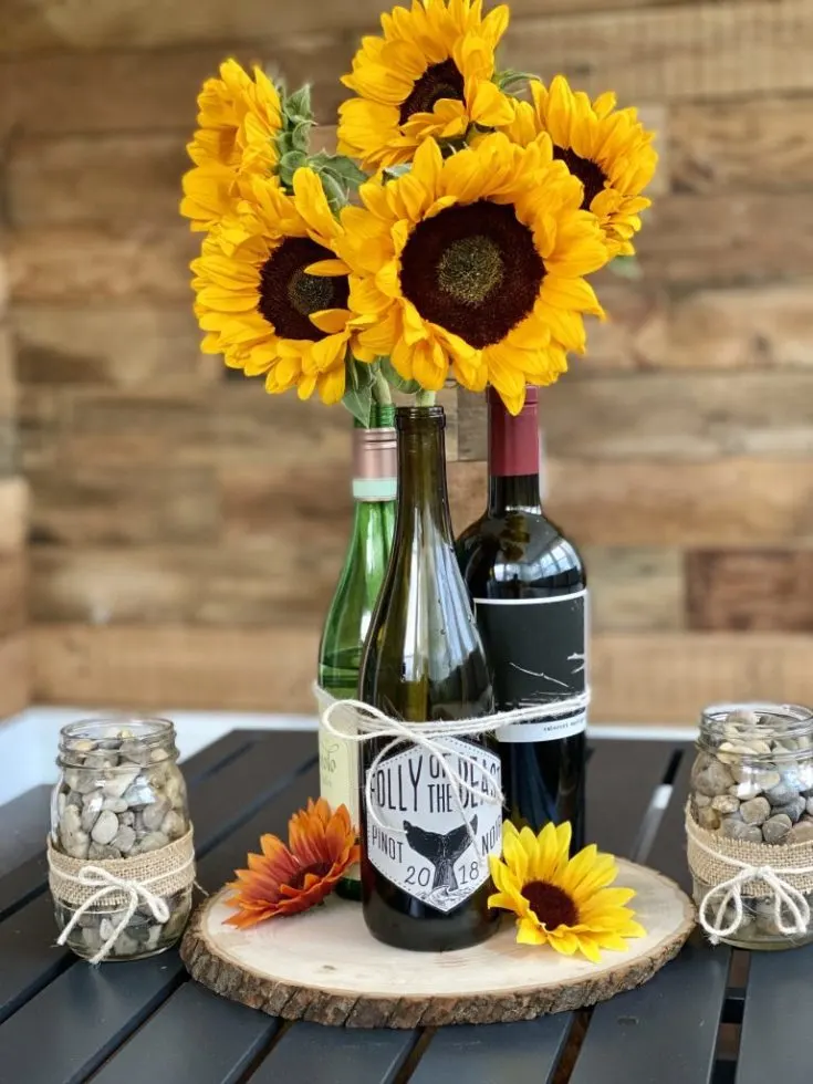 Wine Bottle Decor 35 Crafts For Your Home Mod Podge Rocks   DIY Sunflower Wine Bottle Centerpiece 735x980 .webp