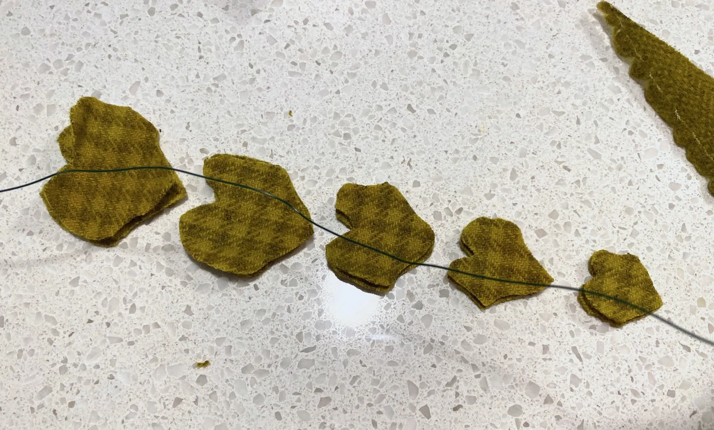 Felt leaves placed along the wire