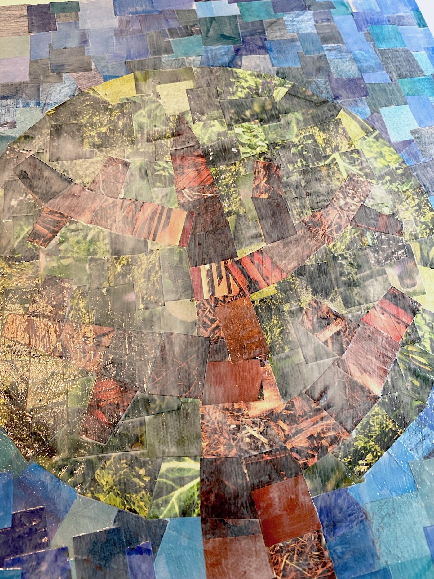 Wet layer of Mod Podge over the magazine collage art