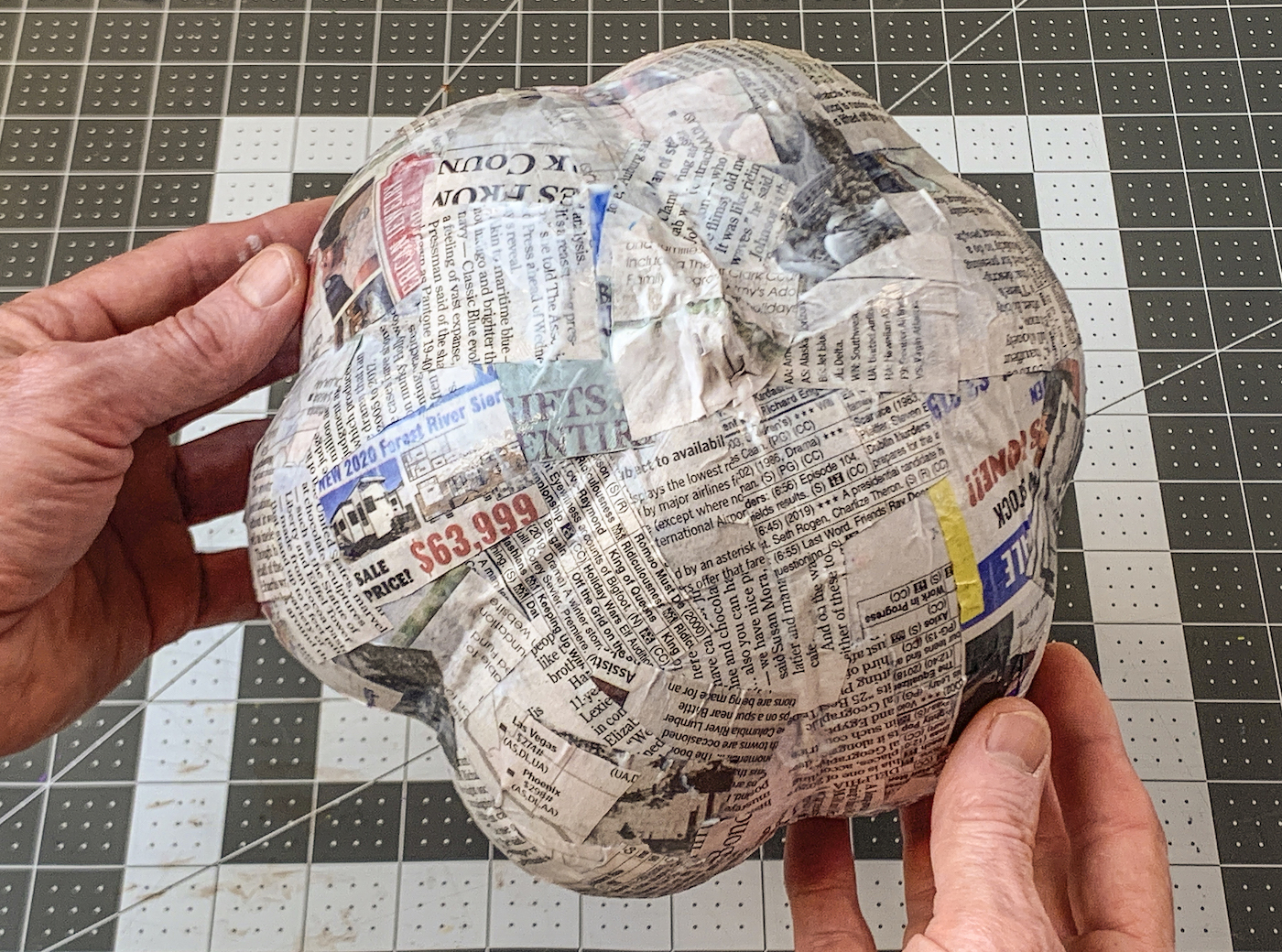 Two additional layers of newspaper added to the baloon