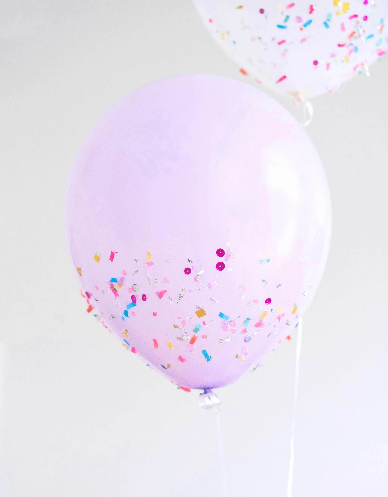 DIY Confetti Balloons for a Colorful Celebration - Mod Podge Rocks