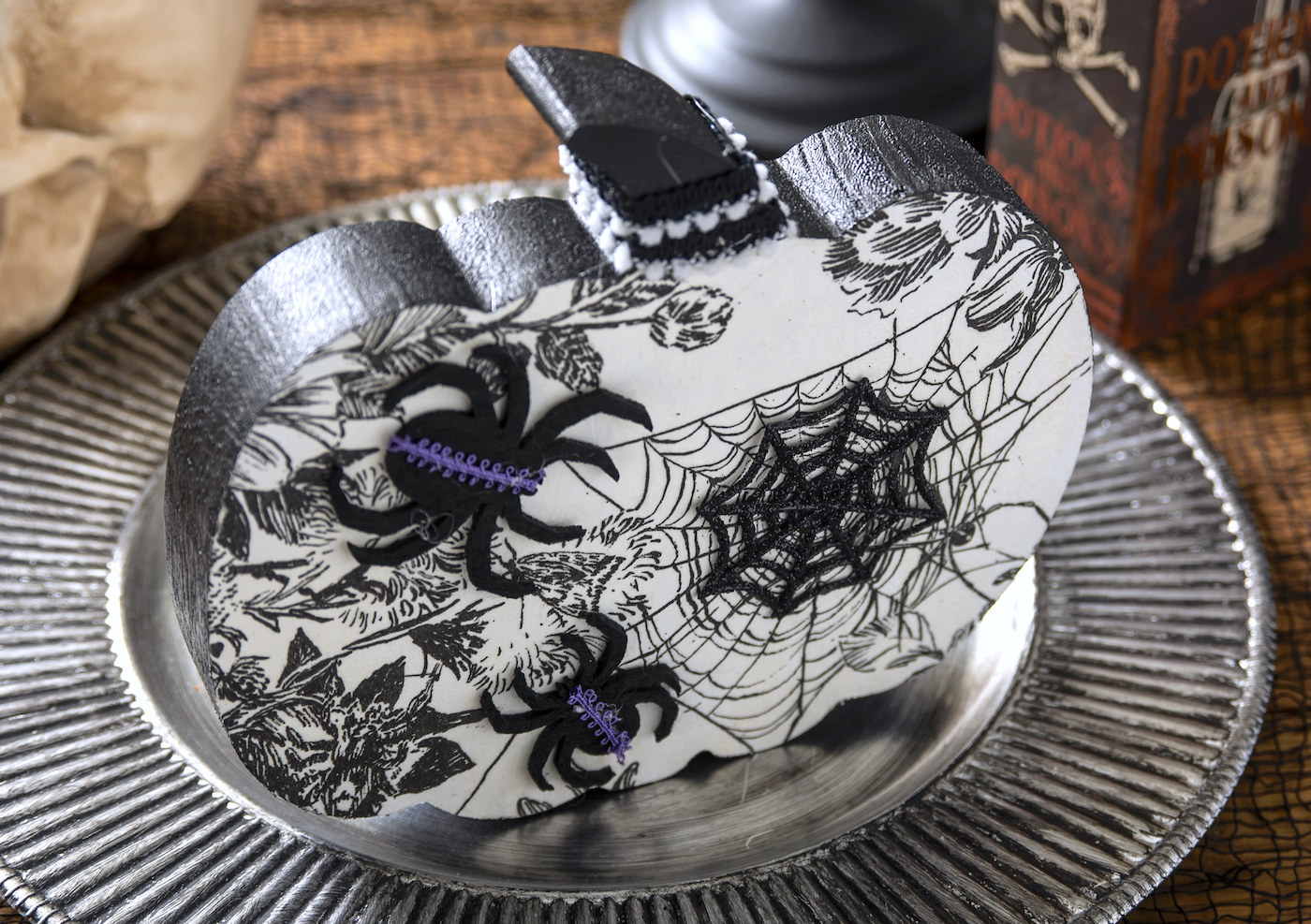 Decorate a pumpkin wood cutout for Halloween