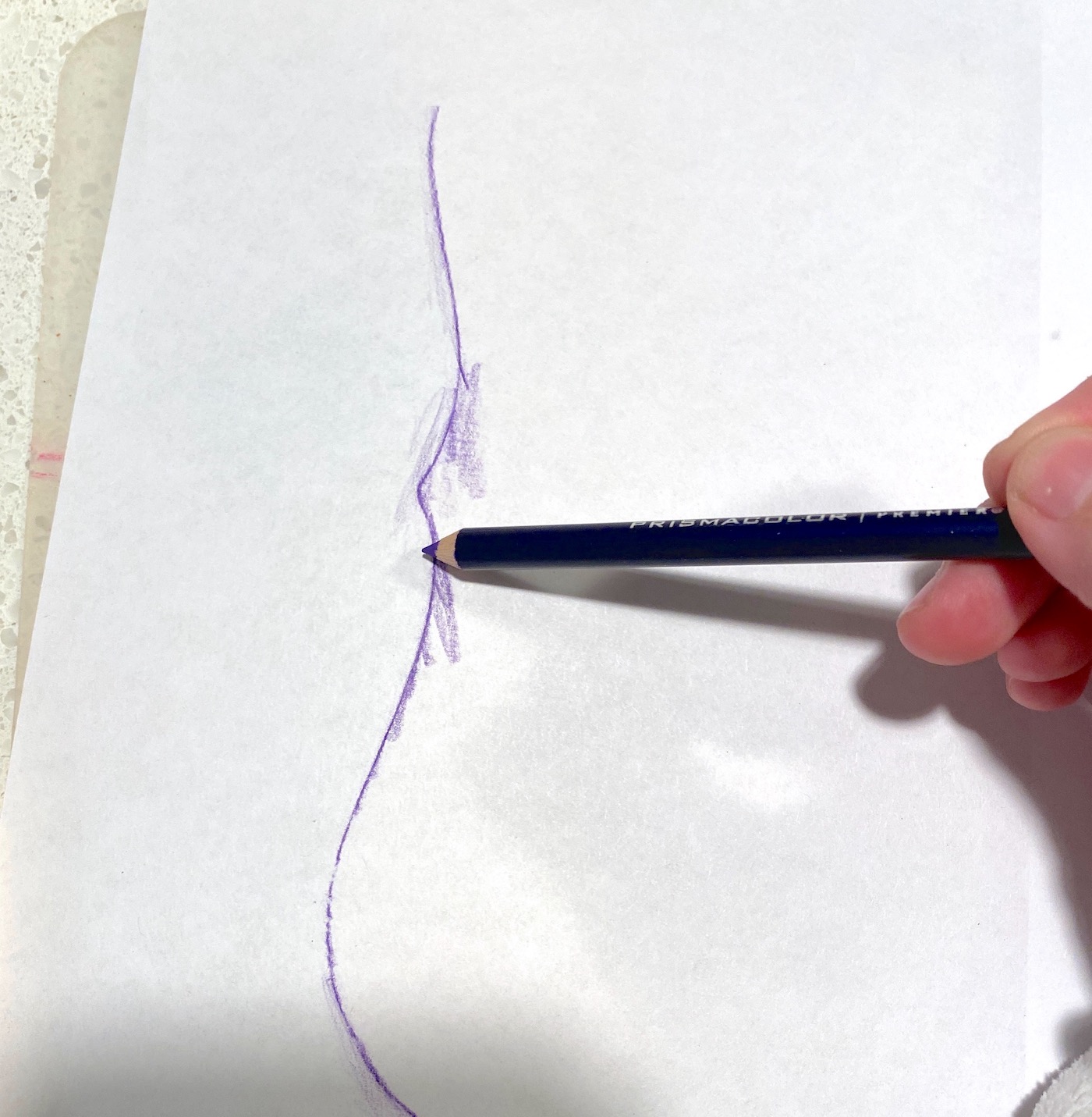 Tracing the plaque with the edge of a pencil