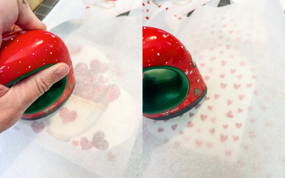 ironing heart napkins down onto the wood hearts