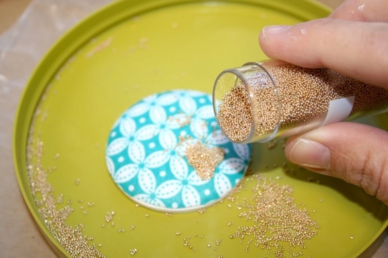 Sprinking microbeads onto the wet Mod Podge