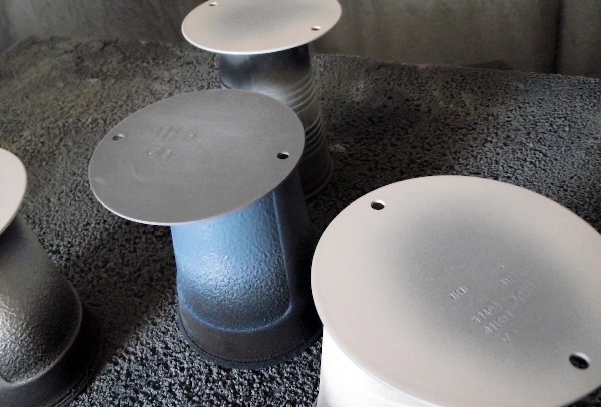 Electrical outlet covers spray painted white