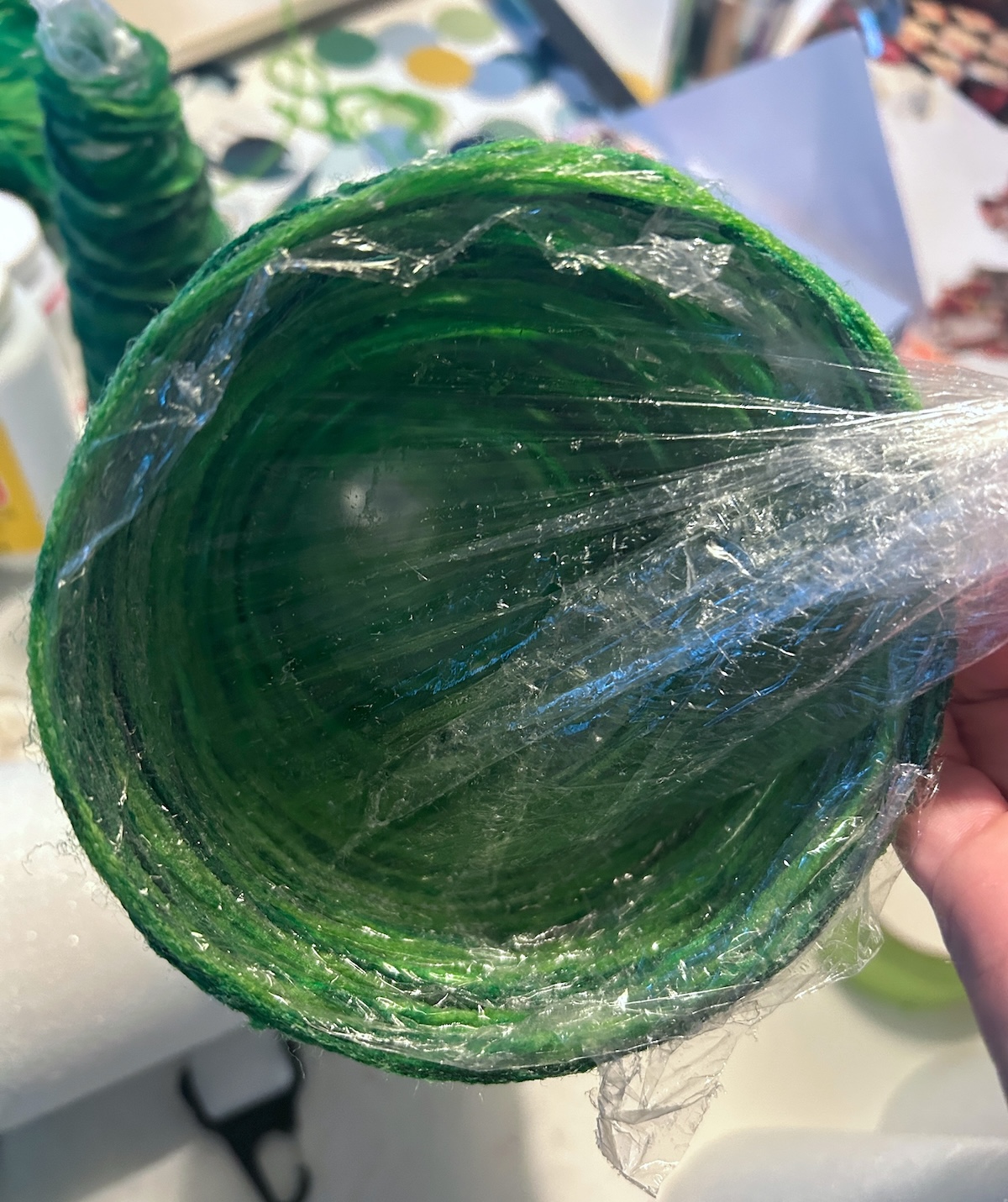 Removing the plastic wrap from the inside of the tree