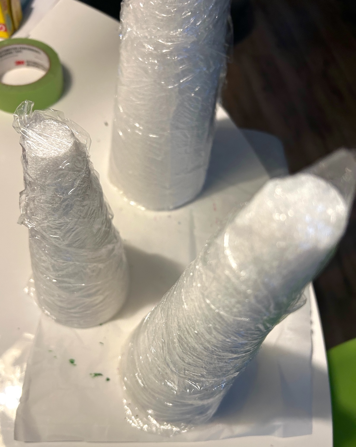 Styrofoam cones with plastic wrap on them