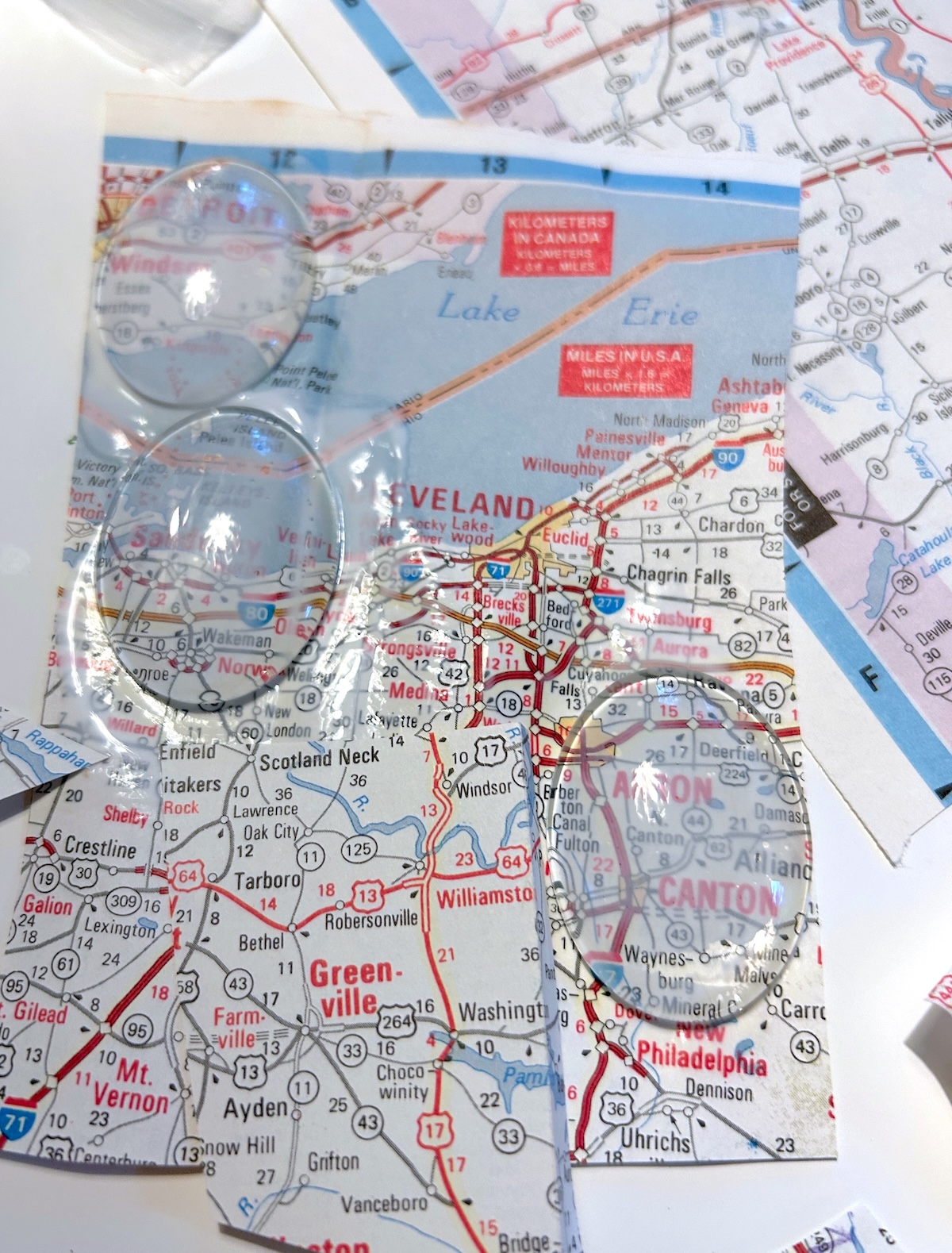 glass domes glued to a map