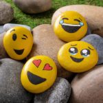 painted rocks like emojis