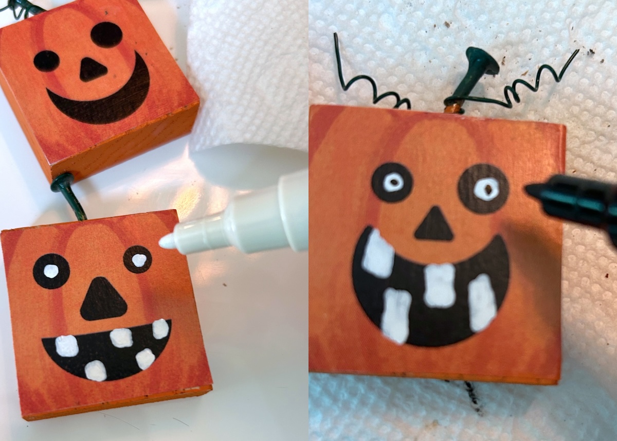 adding jack o lantern faces with white paint pens